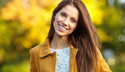 Woman smiling outside