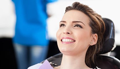 woman smiling in the dental chair 