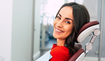 Smiling woman in dental chair