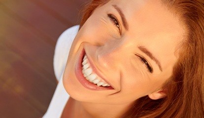 Woman with straight healthy smile