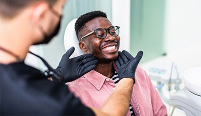 Man smiling in the dental chair