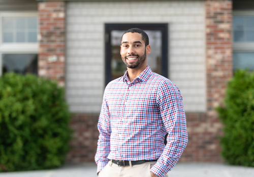 Dr Aten outside of dental office