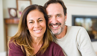 Smiling man and woman