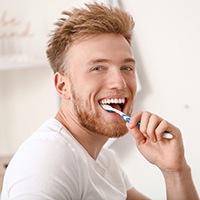 A man brushing his teeth