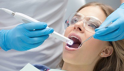 Dentist capturing intraoral images