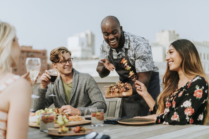 Friends eating kebabs