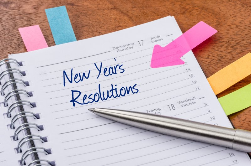 writing new year’s resolutions in journal 